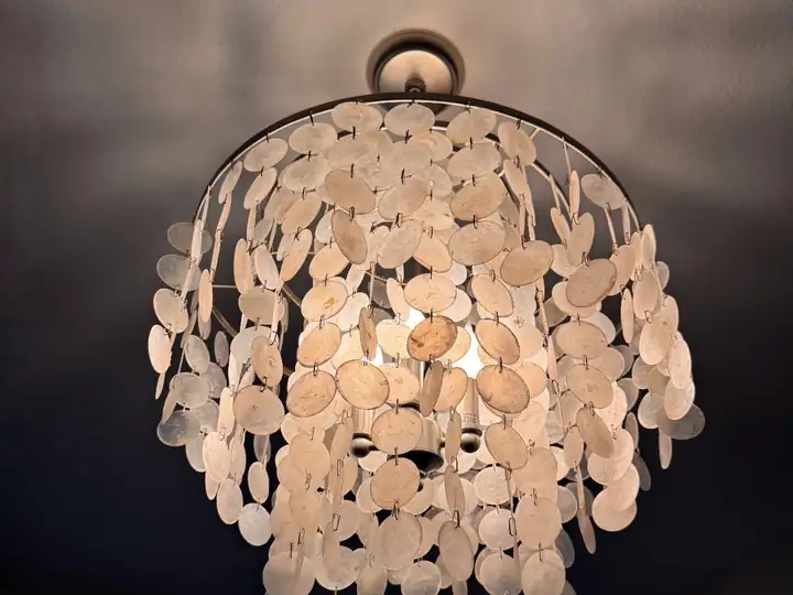 Designer chandelier install by Switch It Up Electric in Southwest Florida